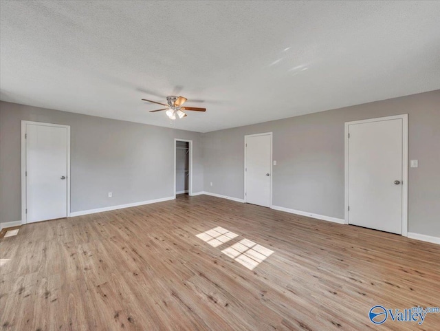 1492 County Road 314, Town Creek, AL 35672 - empty room with wood finished floors, ceiling fan, and baseboards