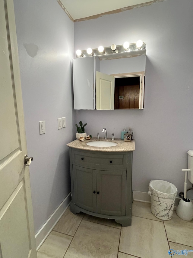 bathroom featuring vanity and tile patterned flooring