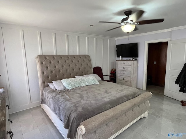 bedroom featuring crown molding and ceiling fan