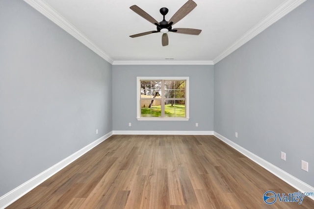 unfurnished room featuring crown molding, hardwood / wood-style floors, and ceiling fan