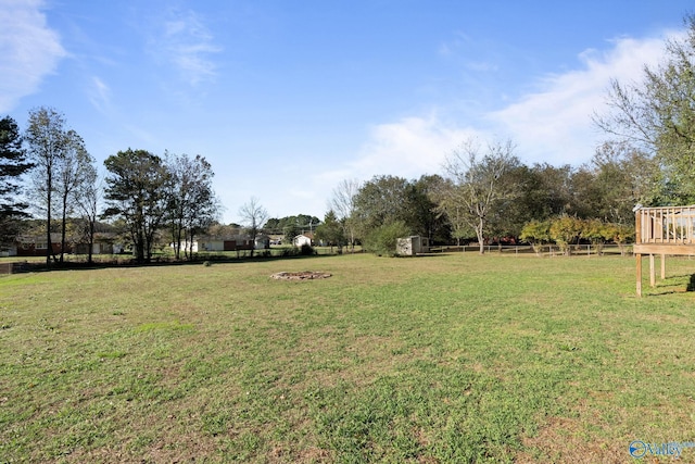 view of yard featuring a wooden deck