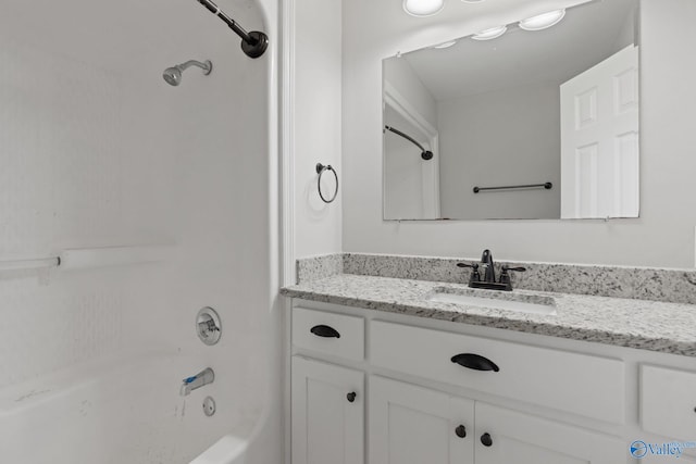 bathroom featuring vanity and shower / bathing tub combination