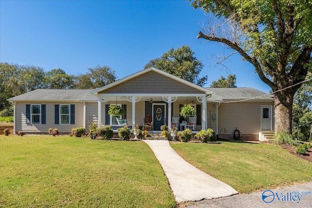 view of front of house featuring a front lawn and a porch