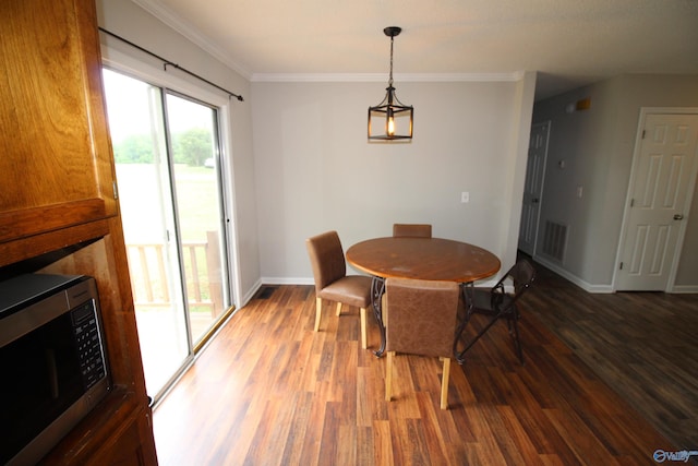 115 Kathleen Dr, Hazel Green, AL 35750 - dining area featuring wood finished floors, baseboards, and ornamental molding
