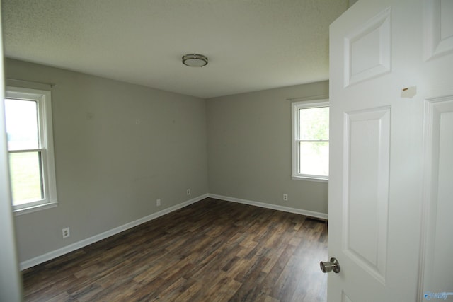 115 Kathleen Dr, Hazel Green, AL 35750 - unfurnished room with dark wood finished floors and baseboards