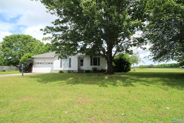 115 Kathleen Dr, Hazel Green, AL 35750 - view of front facade featuring a garage, a front yard, and driveway