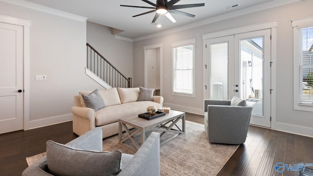 living room featuring french doors, ceiling fan, dark hardwood / wood-style flooring, and ornamental molding