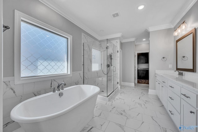 bathroom with vanity, crown molding, plus walk in shower, and tile walls