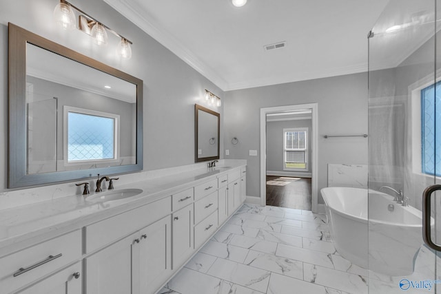 bathroom featuring vanity, crown molding, a tub to relax in, and hardwood / wood-style flooring