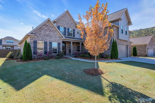 craftsman-style home with a front yard and a garage