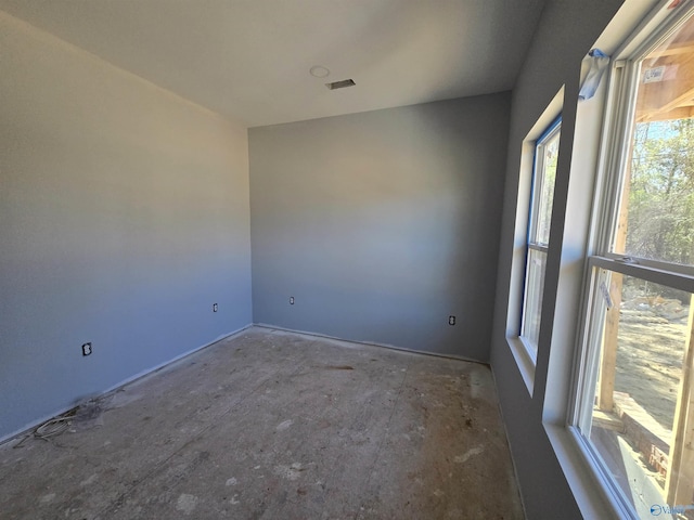 spare room featuring visible vents