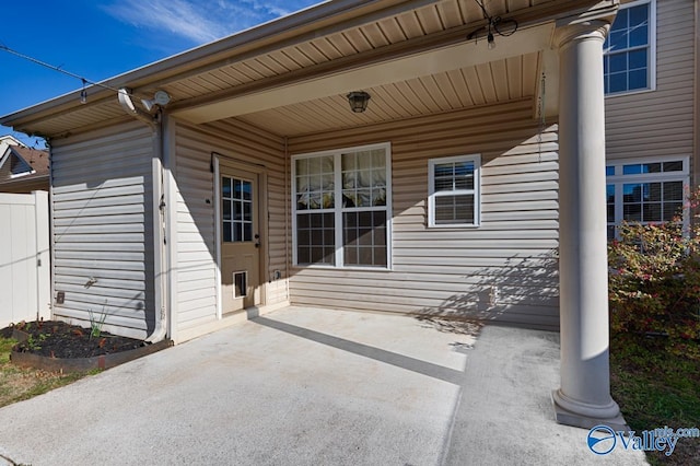 view of patio featuring fence