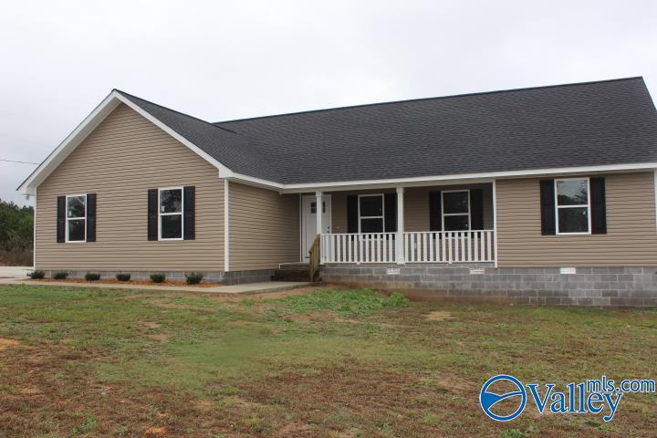 view of front of house with crawl space, a front lawn, a porch, and roof with shingles