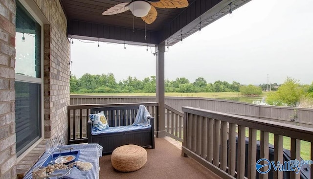 balcony featuring ceiling fan