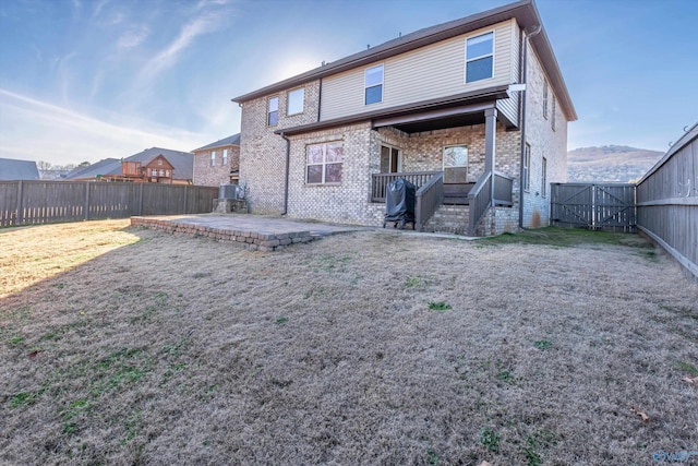 rear view of property with a patio