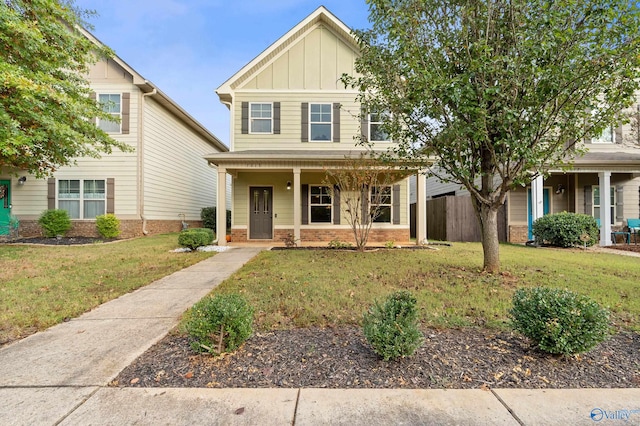 view of front of house featuring a front lawn and a porch