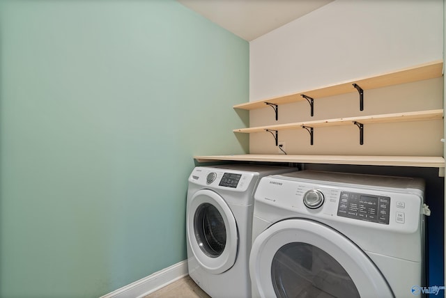 washroom featuring independent washer and dryer