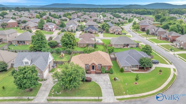 7515 Park Trace Ln SE, Owens Cross Roads, AL 35763 - aerial perspective of suburban area featuring a mountain backdrop
