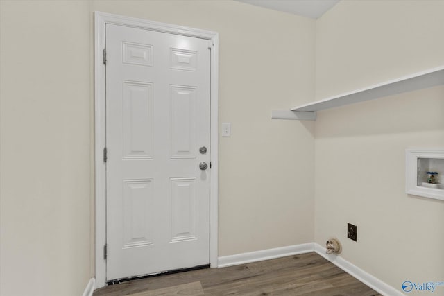 clothes washing area with laundry area, baseboards, dark wood-style floors, washer hookup, and electric dryer hookup