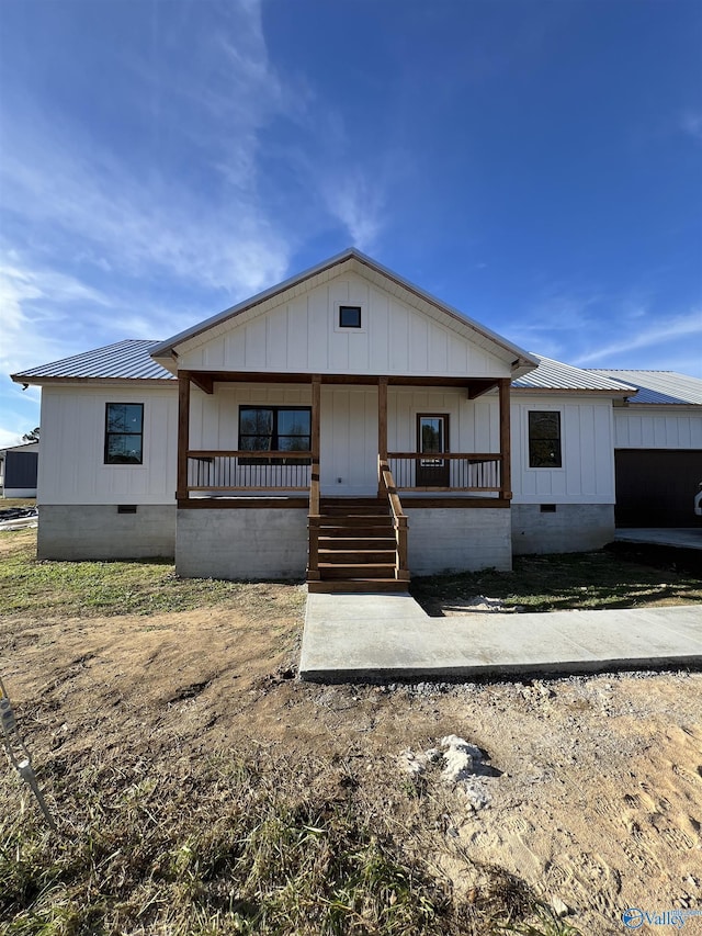 modern farmhouse with a porch