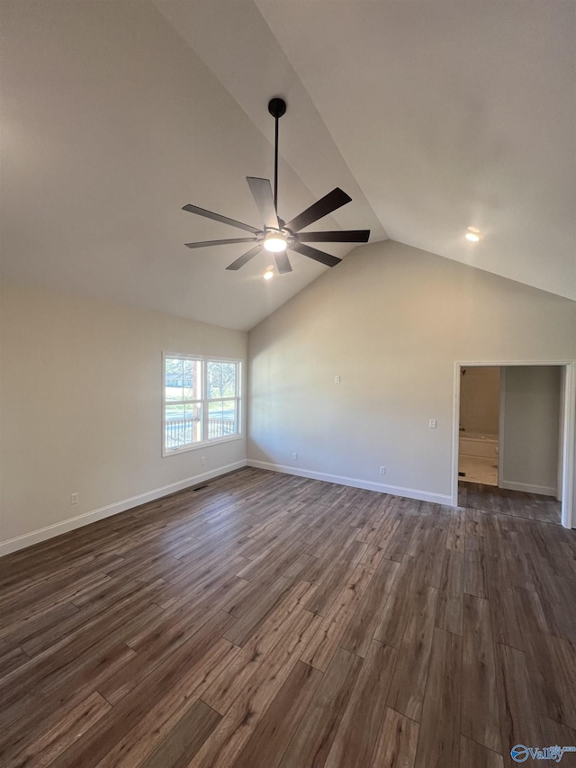 unfurnished room with vaulted ceiling, baseboards, ceiling fan, and dark wood-style flooring
