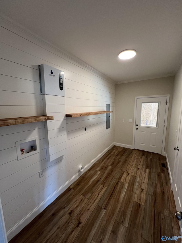 washroom with baseboards, laundry area, dark wood-style flooring, washer hookup, and crown molding