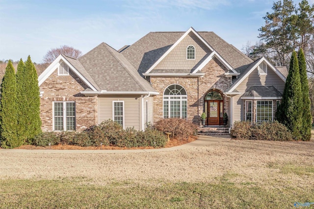 3602 Beason Cove Rd, Steele, AL 35987 - craftsman-style home with a shingled roof, a front lawn, and brick siding