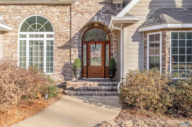 3602 Beason Cove Rd, Steele, AL 35987 - view of exterior entry featuring stone siding and roof with shingles