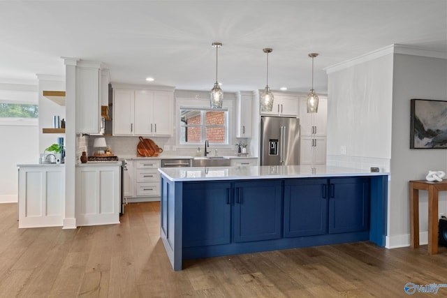 139 Summit Pt, Guntersville, AL 35976 - kitchen featuring appliances with stainless steel finishes, a peninsula, a sink, white cabinetry, and recessed lighting