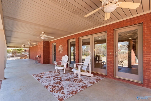 view of patio featuring ceiling fan