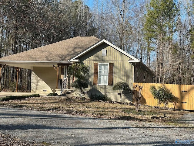 view of front facade with a carport