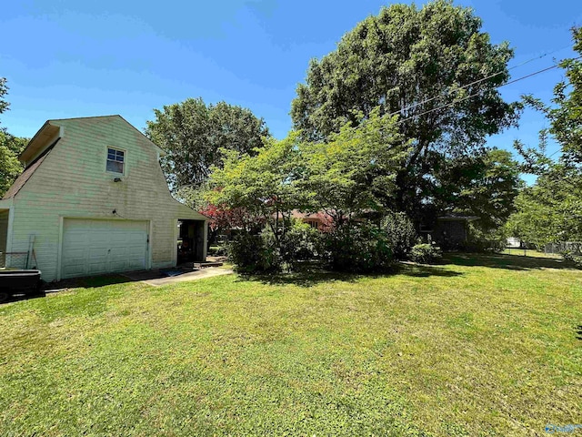 view of yard with a garage