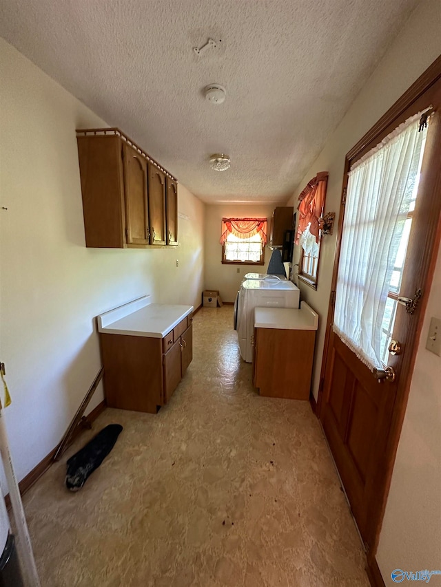 kitchen with a textured ceiling