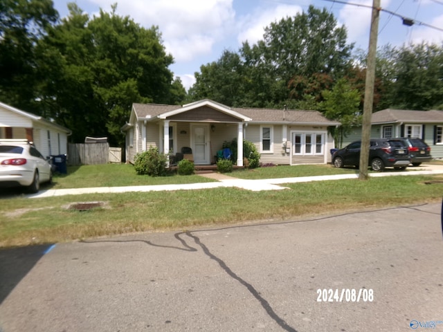 view of front of home with a front lawn