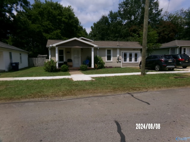 view of front of home featuring a front lawn