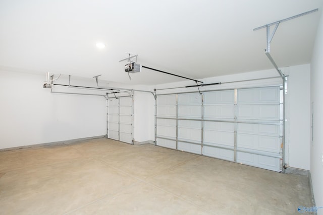 garage featuring a garage door opener