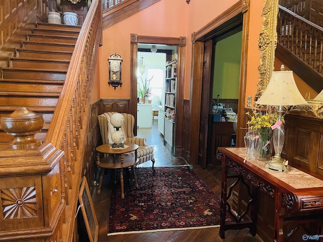 hallway with dark wood-type flooring