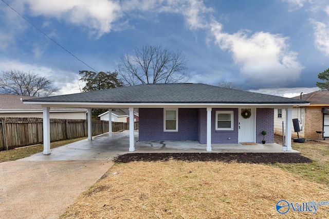 ranch-style home with a carport