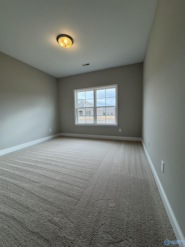 view of carpeted spare room