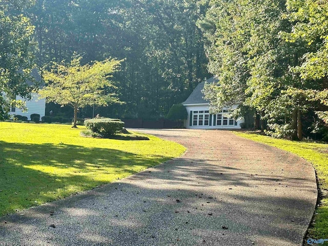 exterior space featuring a front yard