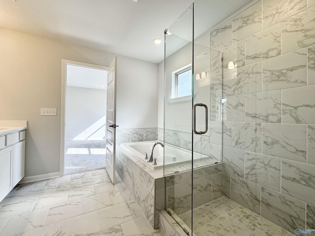 bathroom featuring vanity, baseboards, a stall shower, a bath, and marble finish floor