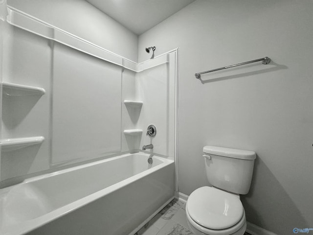 full bath with marble finish floor, toilet, shower / bathing tub combination, and baseboards