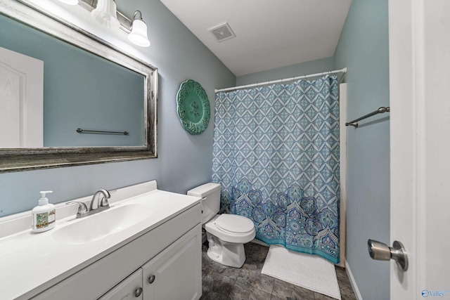 982 Bell Factory Rd, Huntsville, AL 35811 - bathroom featuring visible vents, toilet, a shower with curtain, and vanity