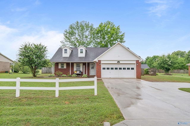 982 Bell Factory Rd, Huntsville, AL 35811 - view of front of house with a front yard, a garage, brick siding, concrete driveway, and fence