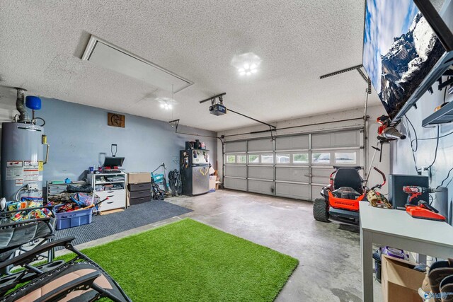 982 Bell Factory Rd, Huntsville, AL 35811 - garage with a garage door opener, water heater, and freestanding refrigerator