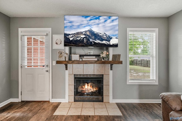 982 Bell Factory Rd, Huntsville, AL 35811 - interior space with baseboards, wood finished floors, and a fireplace