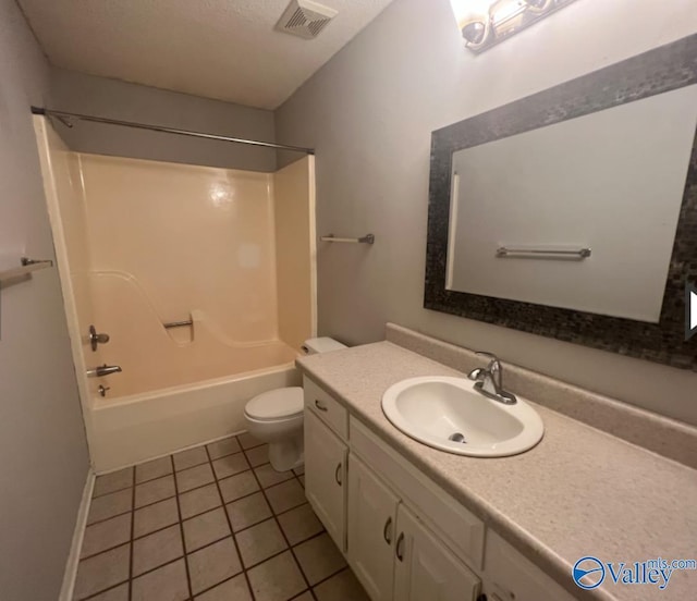 1008 Brighton Cir, Huntsville, AL 35803 - full bath with tile patterned floors, vanity, toilet, and bathtub / shower combination