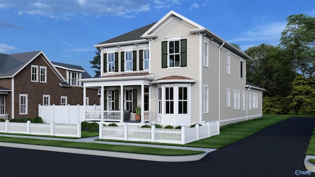 view of front facade with fence and covered porch