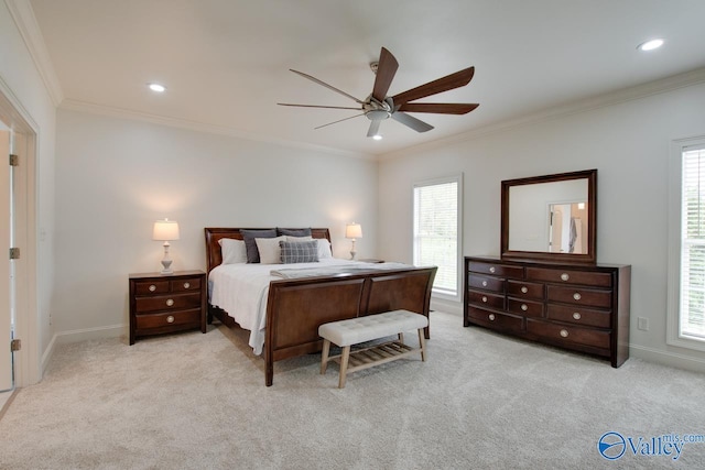 bedroom featuring carpet flooring, crown molding, multiple windows, and baseboards