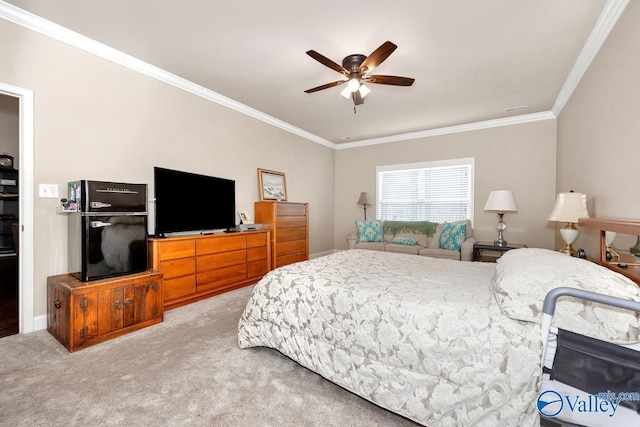 bedroom with light carpet, crown molding, and ceiling fan